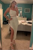 I love this set. It is so flattering and shows your figure. I am glad that I went with a size small. I am usually between sizes and a size 4. It has some stretch! - Hope B.