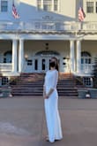 This dress is perfect. I went out on a limb and ordered this in a size small for my elopement. It fit like a glove and I didn't need to make any alterations. The inner lining is a little too long but honestly you really couldn't tell. I wore some cute winter boots that have a slight heel and the dress hit the ground nicely. It does run short so if you are tall and want to wear heels you may need to have length added. The stretch in the fabric made this dress so comfortable. I could see you dancing the night away in this. Added bonus there is no pesky train to trip on! The lace detail is lovely and the back is just so delicate and romantic. This is perfect for a winter wedding in the mountains! - Windsor C.