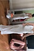 I LOVED the fit of this dress on. It's so flattering and sexy, but still elegant. I was worried it wouldn't be long enough to feel like a wedding dress vs maxi, but the way the bottom fell it would've been perfect with heels on. I tried on a size 6 which fit well but still had a bit of room on top, I think maybe I could've sized down and not needed alterations. The sequin is quite scratchy, so you'd need some kind of liquid bandage on your arms if you needed to wear it all night. I felt it would've been a great option, but my wedding dress try-on crew didn't agree. I ended up going with a completely different style, but I loved this dress. - Stephanie F.