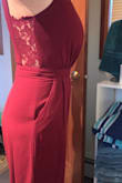 Fabric quality- excellent 
Fit; I'm short, and I don't have a super full chest so I got the shoulder straps altered, and it made the entire thing fit perfectly. I still needed 4 inch heels because I didn't want to alter the pant length. I'm a mom of 5 and I didn't feel like this accentuated the "mom-tummy" at all! 

The band around the middle is bizarrely tight. This was not tight on me anywhere else, but I had to suck it in and get help zipping over that section. Then I felt like it was riding up my ribs all night. (Still my fav date night outfit so just be aware, but I wouldn't not buy this outfit because of it).

In these pictures I wasn't wearing any fashion tape or sticky bras to make cleavage. So this is how it fits naturally for me - Carla C.