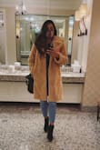 I love love this coat. I wore to a trip to New Orleans during the winter and it was perfect. It's pretty warm and so amazingly soft! It's a little oversized but that's kinda the style. I highly recommend! - Terry S.