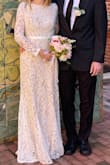 I have received a lot of compliments for this dress at my courthouse wedding. It was a little large in the bust area (32B) but not too noticeable. I have tried both the S and XS and returned the XS as it was way too tight around my waist. Refund received, no issues. It's a great way of shopping in the comfort of your home. - Maryke D.
