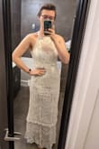 Please note, I am 5'10" and wearing heels in this picture. I love this dress. This dress is perfection. I do not know that if I was even half an inch shorter that I would enjoy the flow of this dress as much un-altered. But the way the tiers hang make it pretty easy to alter the length though, if you wanted to. The fabric and lace details look and feel high quality. The fabric is comfortable and lightweight. - Chance R.