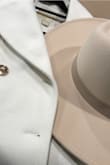 I loved the last hat I purchased, so decide to by another in a light color (got the blush fedora..love!) This was a disappointment because the color is not cream or off white or anything close. Will be returning. I will try another hat in cream. Maybe it was just this particular fedora's cream color that is off. As you can see the coat is clearly off white/cream, as opposed to the hat. - Atrium M.