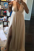 Okay - runs a little large, probably could have gone down a size to a M... but nothing some boob tape and hemming can't fix :) - Ashley D.