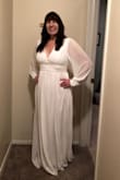 I spent a lot of time online looking for a simple, elegant dress with long sleeves and was so excited with this dress! It rivals all of the more expensive options that I found. It is formfitting in the bodice, drapes very nicely. It is very well-made with high-quality materials. It is long enough to allow for heels to be worn with it. Highly recommend! - Cindy H.