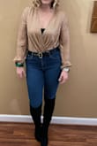 I wore this for Christmas and have mixed it with more casual bottoms for nights out. The v neck is definitely deep so I wore a bralette or pinned it shut. It's a fun amount of sparkle! It's also long enough for my height which is ideal! - Bailey U.