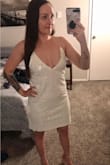 I purchased this dress for my bachelorette party. It fits great. The perfect little fun party dress. The only negative is that the straps fall off your shoulders so easily, and being a dress that you can't wear a bra with, a little risky if you're going to be a little tipsy lol. But otherwise I have no complaints. - Tiela B.