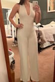 Normally I order a medium in all Lulus clothing, however, because I'm tall I decided to order a Large in this jumpsuit. Unfortunately it was VERY short, and tighter than expected. The material is great but this item runs small. - Autumn K.