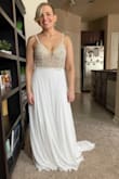I went to two different bridal shops after trying this one on for my friends, and we could not find one even worth trying on. I'm an older bride and was concerned that it would look too "young" on me, but I think it's perfect! I will take it to get altered (much too long)! Other than that, no alterations will be needed. - Jennifer E.