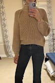 I am usually btwn XS and S with FP but decided to go with the Small and I'm glad I did. The reviews say this is huge but that's not the case w me, it fit great. Also the sleeves aren't super long for me like the review say. I actually wanted a little more length. I think there are just a lot of inconsistencies w FP sizing so you have to be careful. In saying that, the sweater is cute, a really unique piece. It's also thick and super warm. - Carla H.