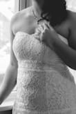 I had a Town Hall wedding and it was the perfect dress. I'm 5'2", it didn't need alterations at all. Was a great and comfortable fit, very flexible light boning in the front and a slight flair at the bottom. A nice sash really dolls it up. The dress looks like a $300 dress (based on brick-and-mortar store shopping attempts). Could not be more happy with the details and the fit. - Kathleen B.
