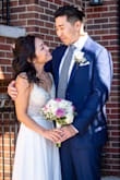 While planning a Covid wedding, I ordered serveral dresses trying to fit the feel of our now small and intimate wedding. The moment I tried on this dress, I knew instantly that it was the one. The dress is gorgeous and has beautiful details. It fit true to size and was very comfortable. I had to get the length hemmed and the straps shortened, but the dress kept it's design and shape very well. It was the perfect dress for our perfect day and made me feel amazing! - Julia C.
