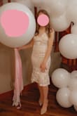 Almost every single person complimented this dress at my bridal shower!! Medium dresses are always way too big around my bust, but smalls are normally too tight around my hips. This dress had just a little bit of stretch, enough stretch that my hips were able to fit in to the small perfectly (it was still a tad big around my chest/bust area)!! I will admit that it was hard to bend down to pick up things, but that is the case with all dresses in this style. I felt so pretty/confident in this dress! - Lauren S.