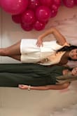 Wore this for my bridal shower and I loved it! I had to tie a little right around my shoulder to hold up the other non-strapped side. - Jessie G.