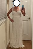 This dress looked like it did in the pictures. Felt like high quality, fit well and would need only the smallest alterations because my torso is somewhat short. Overall it's a beautiful, simple classy dress. - Hannah C.