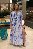 Dress was a little too short for my liking. The dress was about an inch and a half to two inches from floor with slippers on. I would have liked it to have come closer to the floor but didn't have high hopes as it's really hard to find long dresses for a taller girl. Still a beautiful dress! Super soft, has a great weight to it, and has a great flow. The top was a bit big for me, which I found annoying. I have a small chest and noticed I was constantly fixing the top to cover my bra. Great dress for the price. A must for any beach getaway. - Julia R.