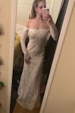 This dress surprised me, I was not expecting it to be as beautiful as it is! Personally I don't see the need to spend thousands on a dress worn for one day. This one looks as if I paid way more than $100. It is a tad lose in the waist and fairly long but it gives me plenty of room to get altered. - Kaitlyn R.