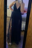 Wearing this for my senior prom. It's a bit long but fits me great with heels. Material is nice and top is adjustable. - Leah H.