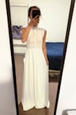 I bought this dress for civil ceremony in May. XXS is a perfect fit for petitte size like me. Great quality and great value. It still needs length alteration as I am short. - Caren L.