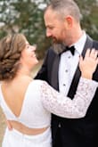 It was so beautiful and I got a lot of compliments on the dress! I'm short so I knew I'd have to get it hemmed, it's 3 layers so it made it a bit more expensive, but it was worth it! Plus those layers came in handy for the arctic weather that descended on Dallas for my wedding! I also had to have the sleeves taken up a bit. I added the belt. The dress has a slight stretch to it so its easy to move around in, and it's comfortable! I highly recommend! - Jill C.