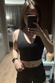 The material is super super soft. It fit nicer than I expected. I'm very insecure about my upper body and this is the only shirt that I feel comfortable actually going out in. Super cute paired with a high rise! - Cecilia L.