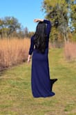 This dress is comfortable and the fabric is nice. It fits me well in size small although I could have gotten a medium. This dress compliments my body shape well. I ordered another black one because I really like it this blue one. Overall, I would recommend this dress. - Belinda X.