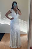 This dress was my #1 choice after buying 3 different dresses to try on and it's perfect! I wanted a lace dress and this fits the description. I'm wearing 3 inch heels and the height is perfect as well. Only alteration is I'm getting bra cups inserted in the dress so I don't have to wear a bra. The price is just amazing! I wasn't going to spend a fortune on a wedding dress if I'm going to wear for a few hours. - Lisa M.