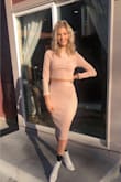 This fit me perfectly but was just the slightest bit uncomfortable. The only issue I had was the bottom of the skirt. I'm not sure what material they used, but it has little to no give, so if you have stairs to walk up, maybe avoid this specific piece. The top is charming and can be worn with other clothing as well! - Audrey R.