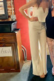 I love this jumpsuit! I'm 5'11" so I've literally never been able to wear a jumpsuit before this one, AND I had to wear it with heels! Maybe could have sized down but I've got big hips and thighs so it probably wouldn't have looked as great. I'm small chested and wore a sticky bra so I kept having to pull it up, but other than that it was a perfect fit! - Taryn R.