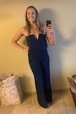 Love this outfit and received so many compliments while at a wedding. The fit was perfect in every area except the very top. It did slide down so much I was constantly pulling it back up - Lindsay D.