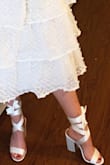 Coming from an anti-heel wearer, these are super cute and worth the pain I will probably experience at the end of the night! The height of the heel isn't too uncomfortable and the heel is chunky enough making it easier to walk in. Excited to wear these to all my bridal festivities! - Shelby C.