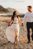 I got this two piece to wear for honeymoon pictures since my husband and I eloped! I wanted something white, and more casual, and this was perfect. Great quality! I had the skirt hemmed because I wore flat sandals. Couldn't be happier! - Nedra B.