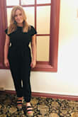 This jumpsuit looked wonderful and stylish! It seemed to get black dye on the skin. The material is a lint magnet - Christine M.