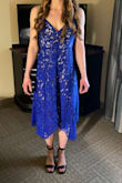 I wore this for a rehearsal dinner and it was perfect. Fit true to size and wasn't so tight that I felt uncomfortable. The material was high quality the color was beautiful. Great special occasion dress. - Erica J.