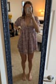 I LOVE THIS DRESS! I bought this dress as an option to wear to my college graduation ceremony and I am obsessed. The fabric and sleeves are great so I can still wear a normal bra and help make my bust look great! I feel so fancy in it and I think it's great for the beginning of spring! I was scared by reviews that I read that it would be way too short and way too oversized with the babydoll fit. The dress IS pretty short but I feel comfortable wearing it for a fun going out occasion or date. So the fit is short which is why I said it ran a little small but I'm pretty tall so I know that doesn't apply to everyone. I was scared the babydoll fit would be too oversized or too casual but the neckline helps to still give you shape and keep you from drowning in a looser fit dress. Buy this dress!! (just make sure you're okay with it possibly being a little short) - Emme M.