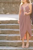 So many wonderful & helpful reviews on this dress so I decided to give it a shot for my engagement shoot. It was every bit of perfect! I was unable to wear a bra with it, but fit perfect and stayed in place! I loved the color, the subtle movement, and how flattering it was! Considering getting it in white for my rehearsal dinner! Well worth the money. Great quality! - Emily L.