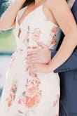 The fabric is GORGEOUS, but the bust sucks! There's only one little snap button that constantly pops open and it gapes badly. It ruined soooooo many of my engagement pictures. - Kelsey O.
