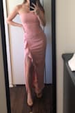 This dress is so flattering (just needs to be ironed in the photo)!! I'm a size 0/2 in most clothes/dresses and the XS fit perfect. I am 5'3 and with heels the dress is a perfect length. Fits well in the chest area and doesn't seem like it will fall down. - Laura L.