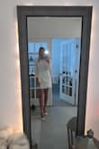 This dress is so simple and chic. I am using it for my rehearsal dinner and bachelorette party with heels (also from Lulus) and I'm so excited! 
I got an XS, and it fit nicely, but it's not flexible. It's a little see through too, so I need to wear spandex underneath. - Jasmin L.