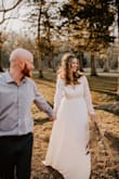 Ordered this dress for a fun anniversary photo shoot. Was more than pleased with it- actually was a little upset I ever spent more for a "real" Wedding dress. The top was supportive and I was able to go braless, which for me (especially while currently breastfeeding) is a real miracle lol. The waist fit appropriately snug then is so pretty and flow-y and very forgiving. It's definitely long and had I needed it for a real event I would have it hemmed but for pics it was great! Fast shipping & also was pleasantly surprised to see it shipped with a garment bag as well! Very satisfied, thanks! - Ashley S.