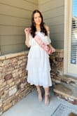 I bought this dress for my bridal shower and got SO many compliments! It's so stunning and comfortable. I usually stay away from off-the-shoulder styles because they tend to not stay in place for me but this one didn't bother me at all. Definitely would recommend for any brides-to-be! - Liz G.