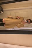 Great quality. Cute paired with a long boot. Comfy. A little boxier than I expected but would get again. - Eden S.
