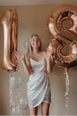 The dress is a little loose on me but otherwise perfect! Really nice material, feels expensive and beautiful. Made my eighteenth bday pics look great:) - Bekah W.