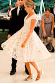 Stunning. I wore it because I did a fast swing dance for my wedding and had to change out of my gown. - Samantha B.