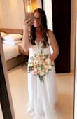 The material on the dress is exactly what I was hoping for!! Light and airy but not see through. It was perfect for my outdoor beach wedding!! - Allie S.