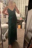 The dress was absolutely gorgeous. I got a ton of compliments on it and it held together really well! It shipped super quickly and I had no issues with it! I wish it was a tiny bit longer but I'm also pretty tall. - Jordan H.