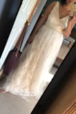 Love love this dress! This was not the wedding dress style I had in mind but I was drawn to it. I had ordered a small first and it was a little too tight. I sent back for an exchange and the medium fits perfect, with a little alterations which was expected. Love that delivery time was quick (within a week) and they didn't wait for my return to sent out the exchange. I brought it in this morning for alterations and will be getting it back in 3 weeks which I am excited about. This dress makes me feel elegant and beautiful and I've gotten a lot of compliments from friends and family already. Even the seamstress was impress with a reasonable price. I just can't wait to see the look on my soon to be husbands face when he sees me in this! Thank you Lulus for making this dress to impress everyone on my big day, especially me! - Sandy S.