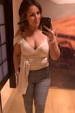 I originally ordered a different color in a Large and felt like my busts were going to bust out, ordered this color in XL and was allot more comfortable. Love it, got so many compliments on it. - Johana R.