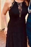 The dress fits awesome! I got so many compliments on it! It was long on me but totally worked fine. I have shorter legs so the slit did not come up high. The material is nice and the dress is lined. Perfect mix of sexy and classy. - Megan O.